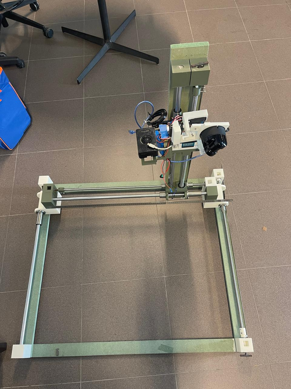 AeroClean's multi-axis test rig with a glass sample